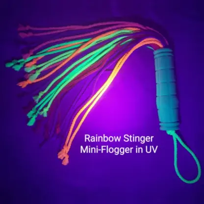 Primal Desires Rainbow Stinger Mini-Flogger under UV light